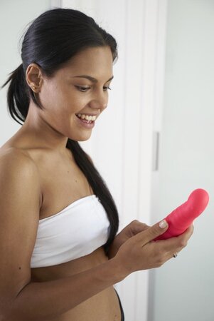 Two fitness girls please each other by licking and shoving pink dildo