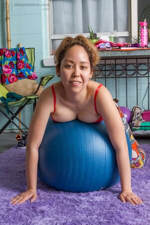 Yoga girl with a hairy vagina needs no clothes when she does exercises