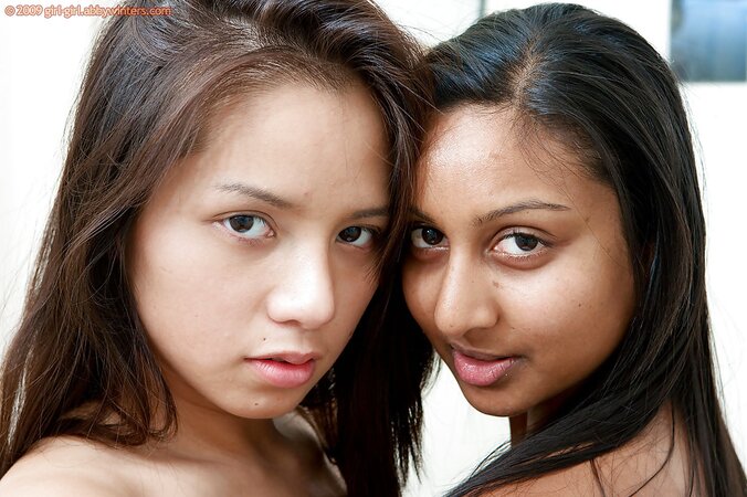 Brunette young women kiss and display unshaved vaginas in the run-up to licking
