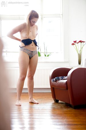 Student with a camera often spies on a small-tittied roommate with a ponytail