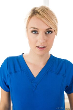 Female in a blue massage suit meets another client being completely naked