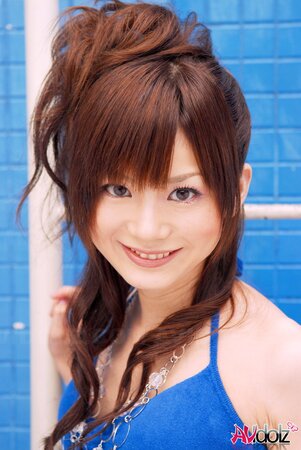 Skinny Japanese teen poses on cam somewhere in private swimming pool