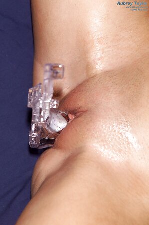 Stepmom is out of town so she won't catch girl playing with speculum in bedroom