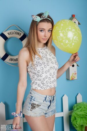 Girl with balloons Nessa H flaunts small fun parts including smooth muff