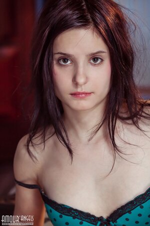 Innocent teen doesn't hesitate to take off lingerie and pose naked on the bed