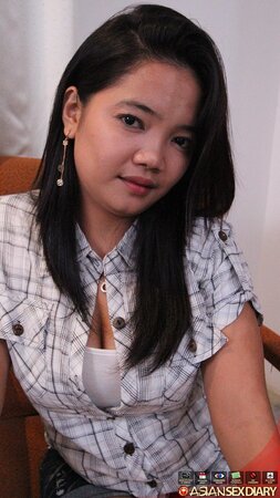 Asian chick in a checkered shirt sucks and gives hairy cunt to boy for drilling