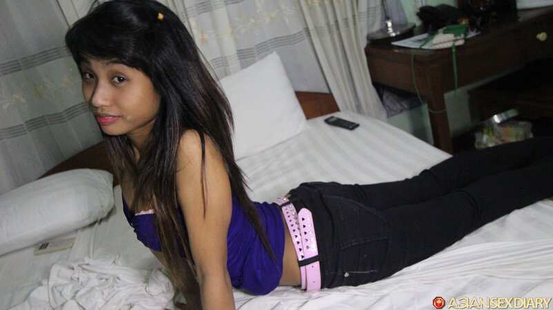 Filipina chick takes her pink underwear off and exposes trimmed cunt