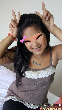 Thai girl with braces spreads legs under the condition that she remains anonymous