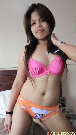 Adorable Asian babe doesn't mind if man drills and creams her trimmed cunny
