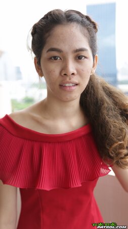 Thai slut in a red dress never stops smiling even in the backseat of a taxi