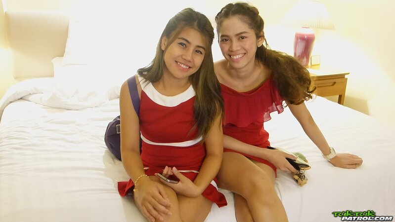 Thai slut in a red dress never stops smiling even in the backseat of a taxi