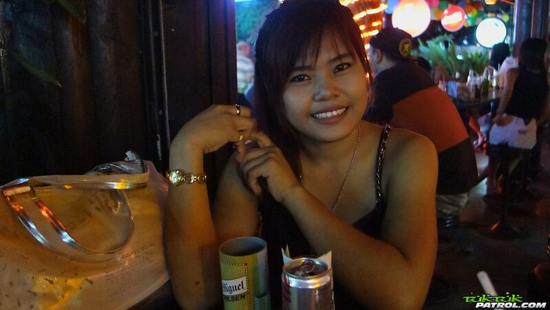 Pornographer buys pretty Thai girl a drink to make her pose without clothes on