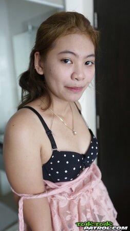 Cunning man makes Thai teen demonstrate small titties and hairy vagina