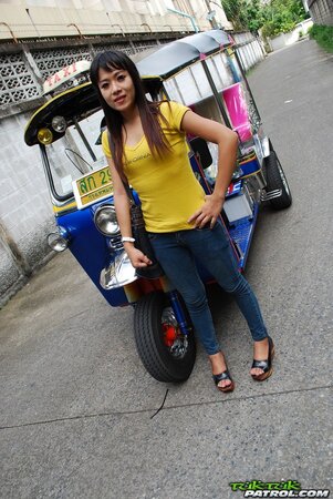 Naughty Eastern girl in yellow T-shirt and jeans finds a guy who pays for posing