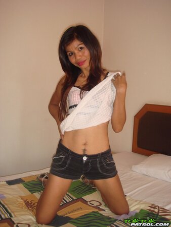 Slender Thai girl poses for guy after taking off clothes and red lingerie