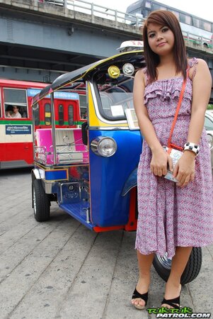 Asian teen Tukta with red hair wears sexy violet dress and prefers Tuk Tuk taxi