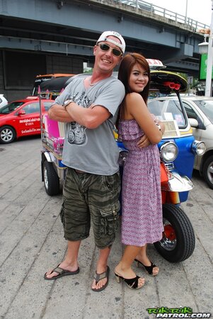 Asian teen Tukta with red hair wears sexy violet dress and prefers Tuk Tuk taxi