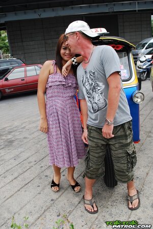 Asian teen Tukta with red hair wears sexy violet dress and prefers Tuk Tuk taxi