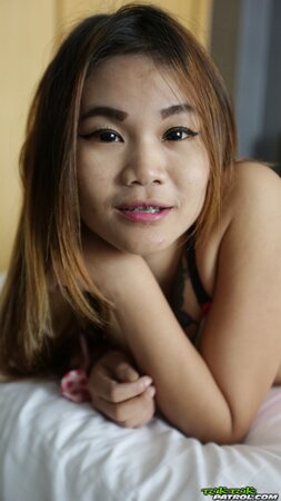 Attractive Thai teen not shy to take off bikini and pose completely naked