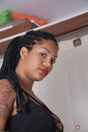 Lascivious Mulatto chick wears very obscene outfit and even more she takes it off