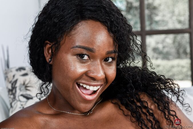 Cheerful babe Charlie Rae with black skin flaunt her private body parts