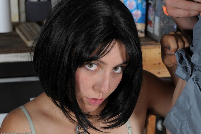 Girl with hairy pussy looks with her innocent eyes into the camera being fucked