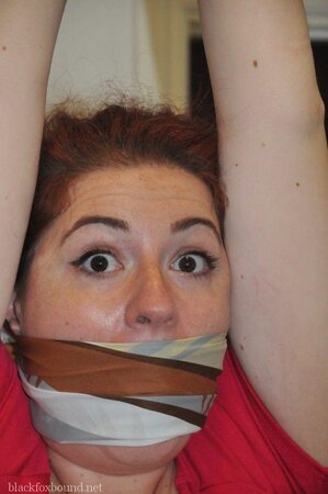 Woman in red dress is restrained by husband for being a bad wife and sex partner