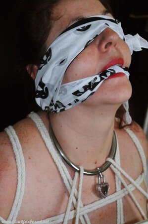 Chubby redhead is naked and tied up to chair by her dominant husband