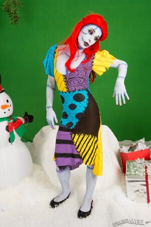 Pornstar with fiery red hair looks fuckable even when cosplaying a zombie