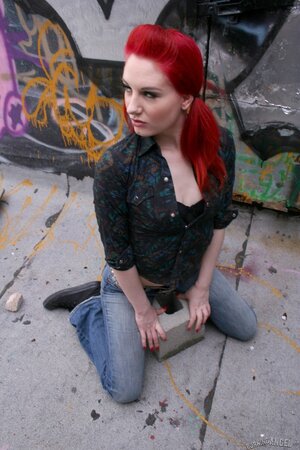 Pale-skinned redhead deletes the rock'n'roll panties and demonstrates her pussy