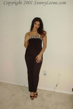 Indian girl in heels exposing her firm breasts and excellent body on the floor