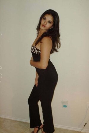 Indian girl in heels exposing her firm breasts and excellent body on the floor