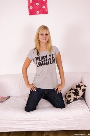 Young blonde with huge boobs licks a glass dildo and drives it into sugar twat