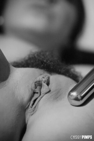 Black and white pictures of the girl with juicy melons masturbating hairy pussy