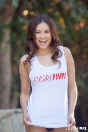 Porn actress wears famous site top that she lifts to flash tits and touch nipples