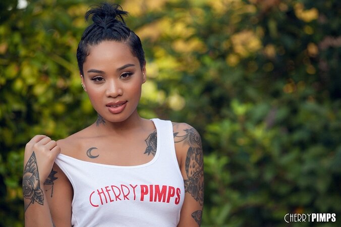 Honey Gold is a young Asian porn actress with first-class body and tattoos