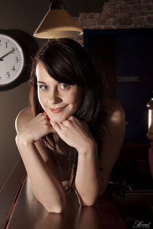 Girl with pretty face and chin dimple can pose naked after the bar is closed