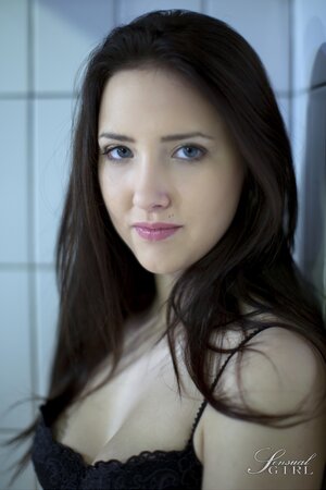 Pool isn't filled with water so the dark-haired cutie can pose naked there