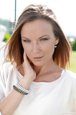 Skinny Russian MILF Allison impales twat on vibrator on a big green field