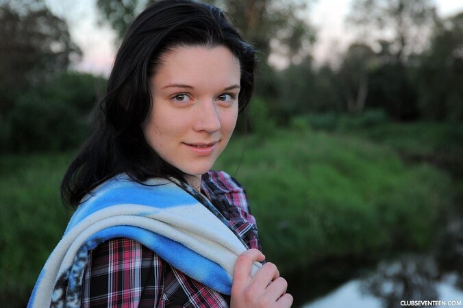 Beautiful teen goes to pond to rest with glass sex toy in shaved twat