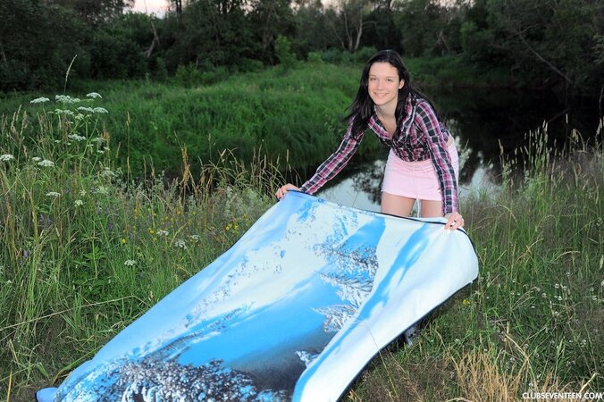 Beautiful teen goes to pond to rest with glass sex toy in shaved twat