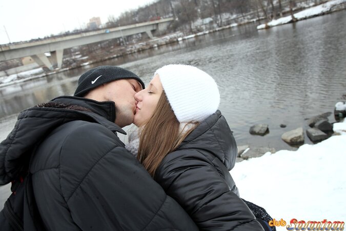 Spicy girl plays in the snow with young man and hurries home to play adult games