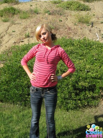 Fragile teen wench takes off clothes to show her small tits and cute ass outdoors