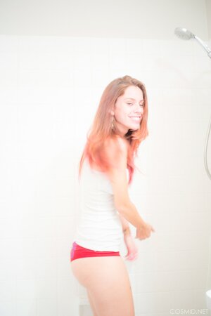 Slender Latina stunner gets wet and reveals her big natural breasts in the shower