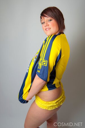 Chubby football fan pulls T-shirt off to show off her big tits and sexy panties