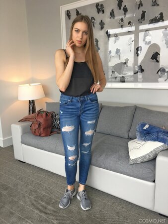 Charming amateur blonde with tiny tits puts off sexy black lingerie for the cam