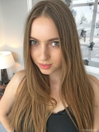 Charming amateur blonde with tiny tits puts off sexy black lingerie for the cam