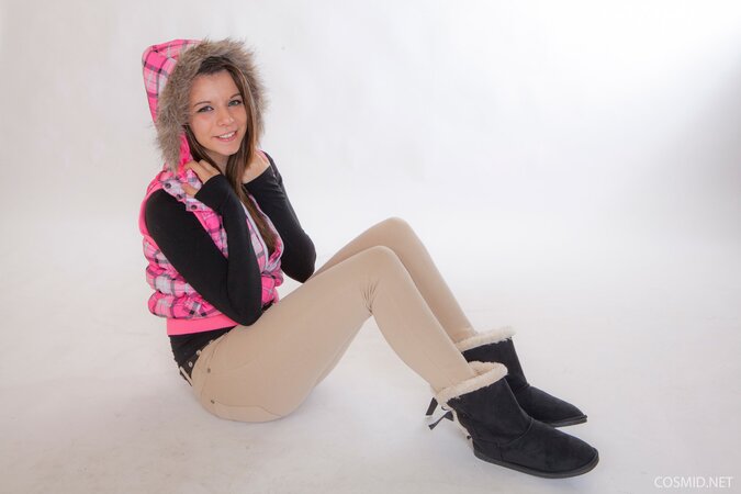 Busty young beauty teases with her big naked breasts and smooth pussy