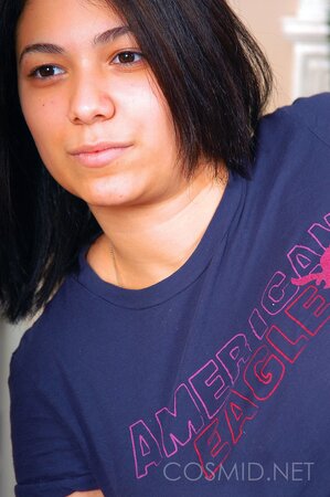 Big-assed Mulatto gal strips to lingerie and teases with her perfect curves