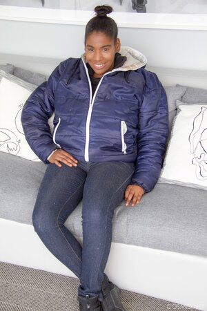 Amateur Ebony fatty in jeans unveils her impossibly-huge breasts for the camera